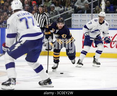 Tampa Bay Lightning center Conor Geekie (94) sets up for a shot between ...