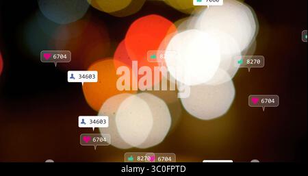 Image of colorful bokeh lights with social media notification icons floating Stock Photo