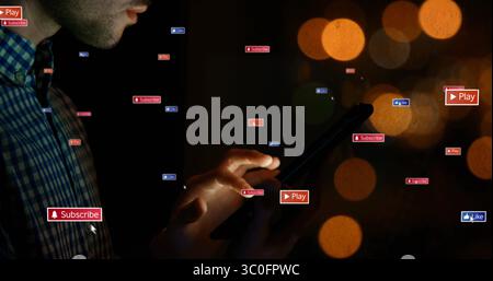 Holding smartphone, person interacting with image buttons over blurred lights Stock Photo
