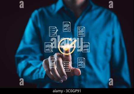 Businessman touching icons representing document verification, quality control, and certification assurance. Concept of ISO standards, compliance Stock Photo