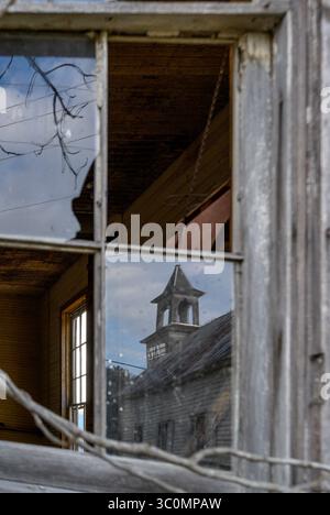 The abandoned clapboard chapel in Wells Valley is suffering from severe neglect Stock Photo