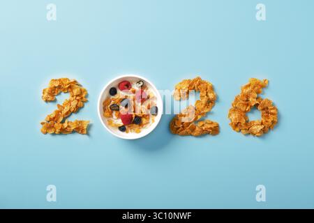 Creative breakfast design with cereal numbers 2026. Concept of new year nutrition, healthy start, and morning energy. Stock Photo