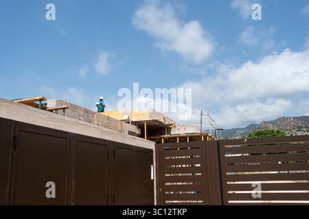 Workers laying the foundations for a summer villa in a luxury residential area, Benicassim, Costa del Azahar, Castellón de la Plana, Spain Stock Photo