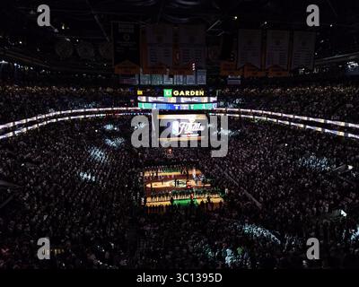 Packed TD Garden arena during the 2022 NBA Finals with teams lined up and the Finals logo displayed on the scoreboard, Boston, Massachusetts, USA Stock Photo
