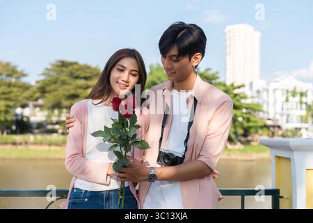 Valentine's day surprise romantic gesture park bright atmosphere close-up love story Stock Photo