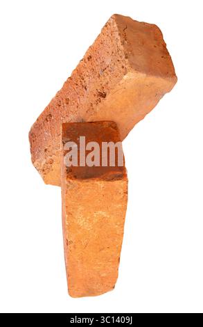 Side view of two cracked old red or orange bricks in stack is isolated on white background with clipping path. Stock Photo