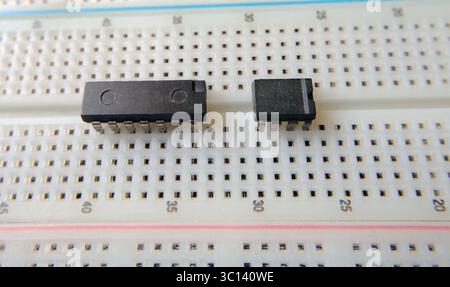 Starting an electronics project. Circuit design consisting of integrated circuits. Stock Photo