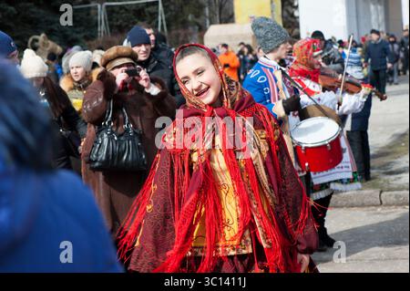 Festive participants gather in Kyiv for Maslenitsa, sharing joy and tradition together. Stock Photo