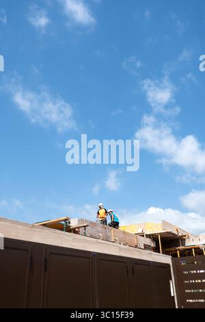 Workers laying the foundations for a summer villa in a luxury residential area, Benicassim, Costa del Azahar, Castellón de la Plana, Spain Stock Photo