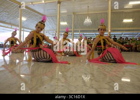 Dancers performed the classical Bedhaya dance with beautiful graceful movements. Stock Photo