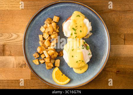 Eggs Benedict on a plate Stock Photo