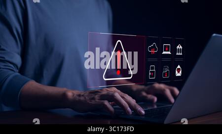 Cyber security warning alert system concept. Businessman working on laptop. Computer network hack, crime and virus, Malicious software, compromised Stock Photo