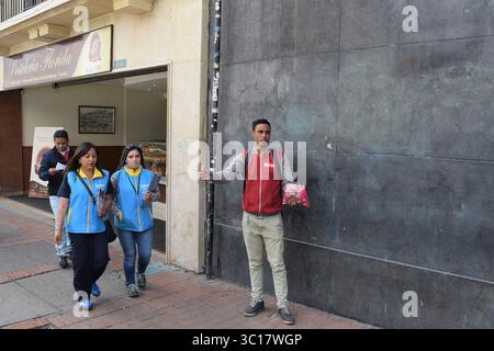 January 25, 2019 - USA - Jose Antonio Avedano, 22, fled Venezuela four weeks ago, walking and hitchhiking to get to Colombia's capital, Bogota. Once a baker in Caracas, he said the shop where he worked closed because they couldn't find any flour. Now he sells candy on the street. (Credit Image: © Jim Wyss/Miami Herald/TNS via ZUMA Wire) Stock Photo