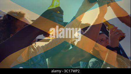 Celebrating group of five friends clinking amber glass bottles on rooftop terrace, with sunglasses Stock Photo