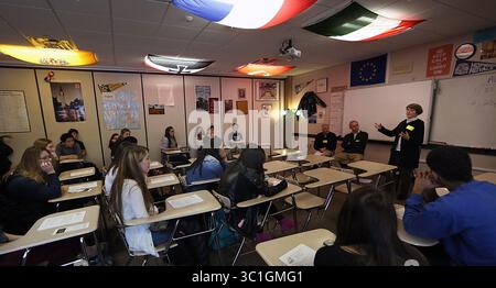 Dec. 18, 2014 - Minnetonka, MN, U.S. - Three retired doctors will be talking to students in Rick Rexroth's social studies class at Hopkins High School. Hopkins High School is working with the Minnetonka Senior Center. Over the next year, senior citizens will be talking to students about the careers they once had, and possibly serving as mentors to the students. It's a unique approach. Most schools are focused on the next high tech gadgetry or hot career - not working with elderly people and learning from their experiences. Doctors participating included: Dr. Chris Meyer (right), MD (pediatric Stock Photo