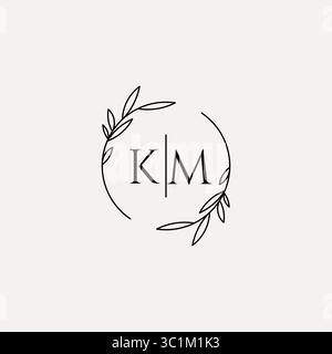 Letter KM wedding monogram logo design with simple natural circle leaf frame vector graphic Stock Vector