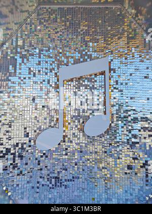 Vibrant mosaic design featuring a prominent musical note, reflecting creativity and artistic expression in a visually captivating way Stock Photo