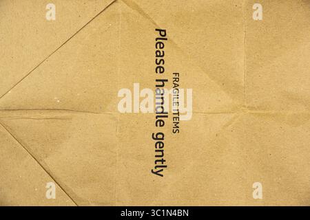 brown paper packaging with Fragile sticker Stock Photo