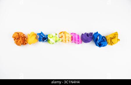Crumpled Paper Balls in Vibrant Colors Isolated on White Background for Fun Crafts or Creative Projects Stock Photo