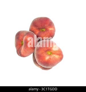 Flat peaches isolated against white background Stock Photo