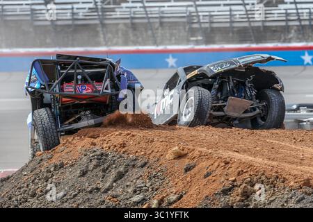 March 31, 2019 - Fort Worth, Texas, U.S - Stadium Super Trucks wreck during the race before the Oâ€™REILLY AUTO PARTS 500 MONSTER ENERGY NASCAR CUP SERIES RACE at the Texas Motor Speedway in Fort Worth,Texas. (Credit Image: © Dan Wozniak/ZUMA Wire) Stock Photo