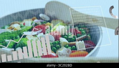 Displaying round white bowl of fresh salad resting on tabletop, with wooden spoon and data overlays Stock Photo
