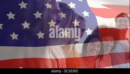 Smiling group of friends standing on plain background, with semi-transparent American flag overlay Stock Photo