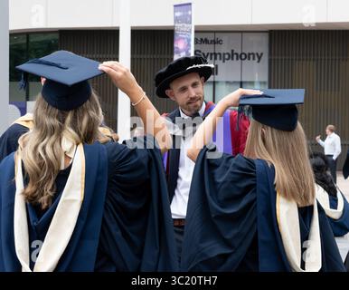 Birmingham City University graduation day, Centenary Square, Birmingham, UK Stock Photo