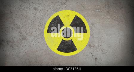 Yellow radioactive sign on grey stone background, banner design. Radiological pollution Stock Photo