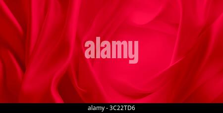 Ripples in red silk fabric Stock Photo