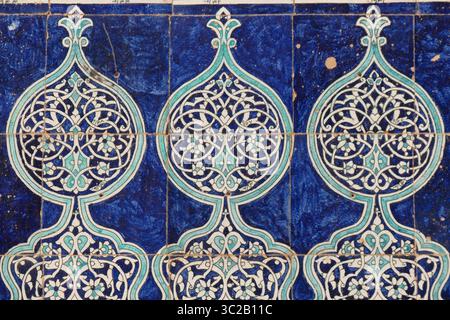 Pomegranate patterns from tiles on the walls of Khiva. Uzbekistan. Stock Photo