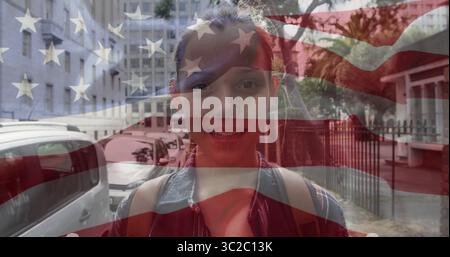 Smiling girl carrying backpack walking on urban street, with American flag overlay and parked cars Stock Photo