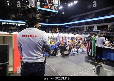 June 1, 2019: Montevideo, Uruguay: The principal judge on the stage during the robotics competition of the FIRST LEGO League Open 2019, at the Antel Arena. FIRST LEGO League (FLL) is an international competition organized for elementary and middle school students. Each year in August, FFL introduces a scientific and real-world challenge for teams to focus and research on. The robotics part of the competition involves designing and programming LEGO Mindstorms robots to complete tasks, and students work out solutions to the various problems they are given and then meet for regional tournaments t Stock Photo