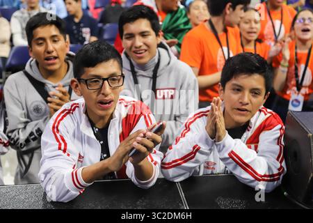 June 1, 2019: Montevideo, Uruguay: Peruvian supporters during  the robotics competition at the Antel Arena in Montevideo. FIRST LEGO League (FLL) is an international competition organized for elementary and middle school students. Each year in August, FFL introduces a scientific and real-world challenge for teams to focus and research on. The robotics part of the competition involves designing and programming LEGO Mindstorms robots to complete tasks, and students work out solutions to the various problems they are given and then meet for regional tournaments to share their knowledge, compare i Stock Photo