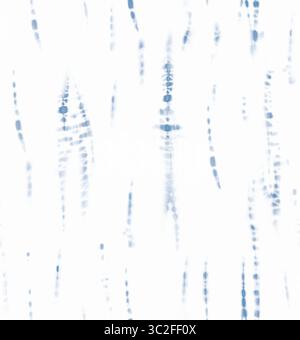A blurred abstract pattern of vertical blue tiedye stripes against a white background, creating a textured and artistic fabric design Stock Photo