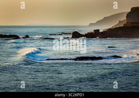 Waves breaking onto the beach at Bude in Cornwall, England, uk Stock Photo