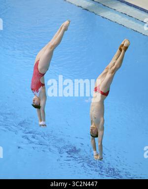 July 13, 2019 - Gwangju, SOUTH KOREA - July 13, 2019-Gwangju, South Korea-Lian Junjie and Si Yajie of china action during the 18th FINA World championships 2019 Gwangju Diving Mixed 10m Synchro Platform at Aquatics Center in Gwangju, South Korea. Competition wins China(gold medal), Russia(silver medal), Mexico  (Credit Image: © Gwangju2019 Organizing Committee via ZUMA Wire) Stock Photo