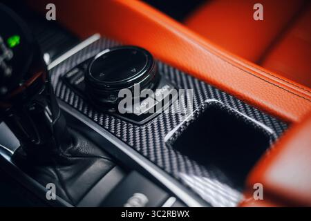 Modern and expensive car multimedia control panel, with a gearbox and start function Stock Photo