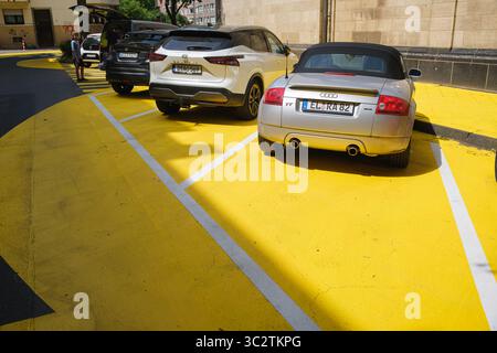 Yellow zones painted on the asphalt for pedestrian safety Stock Photo