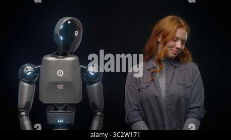 Visualization of Futuristic People and Robots Concept: VFX Animation of High-Tech Humanoid Robot Prototype of Young Woman. Connection and Collaboration Between Humanity and Artificial Intelligence. Stock Photo