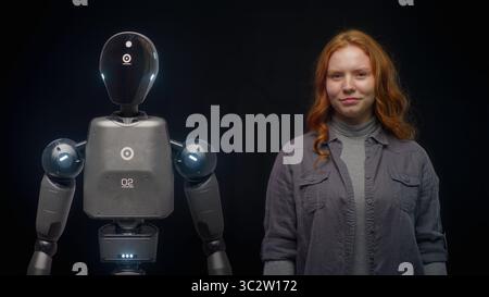 Visualization of Futuristic People and Robots Concept: VFX Animation of High-Tech Humanoid Robot Prototype of Young Woman. Connection and Collaboration Between Humanity and Artificial Intelligence. Stock Photo