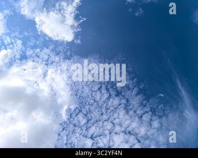 White cloud texture with bright blue sky Stock Photo