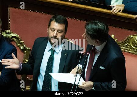 August 20, 2019, Rome, Italy: August 20, 2019, Rome, Italy: Italy's Prime Minister GIUSEPPE CONTE, right,  told the Italian Senate that he would resign as he launched a scathing attack on right-wing Interior Minister MATTEO SALVINI, left, who was sat beside him in the chamber on Tuesday. Conte said Mr Salvini had been 'irresponsible' in creating a new political crisis for Italy for 'personal and party interests'. Salvini, the leader of the nationalist League party, had tabled a no-confidence motion against Mr Conte. (Credit Image: © Cosimo Martemucci/SOPA Images via ZUMA Wire) Stock Photo