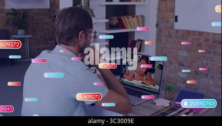 Tutor guiding student taking notes on laptop in home office, with digital overlays, copy space Stock Photo