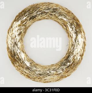 Gold thread wreath for party decoration isolated nature background with clipping path Stock Photo