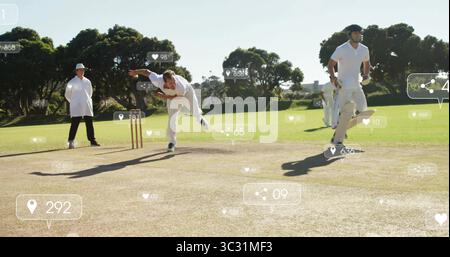 Delivering bowler in white uniform throwing ball on pitch, with stumps and digital icons Stock Photo