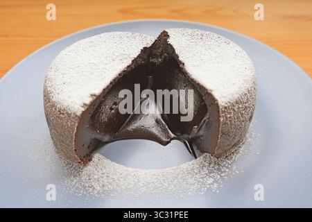 Closeup of Mouthwatering Freshly Baked Dark Chocolate Lava Cake Stock Photo