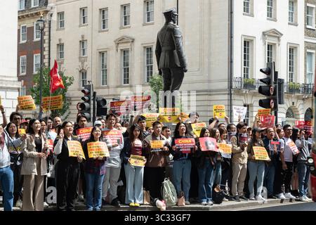 London, UK - May 20, 2025 - An event took place in front of the Embassy of the People's Republic of China in London, where Myanmar protesters gathered Stock Photo
