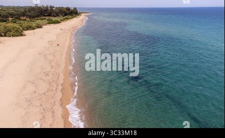 Aerial view of a tropical lagoon with turquoise water surrounded by ...