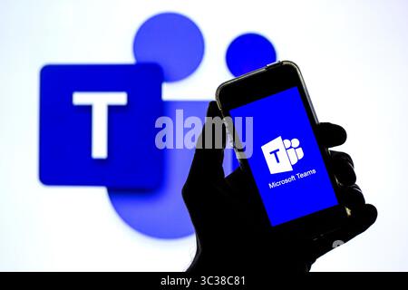 April 20, 2021, Barcelona, Catalonia, Spain: In this photo illustration a Microsoft Teams app seen displayed on a smartphone with the Microsoft Teams logo in the background. (Credit Image: © Thiago Prudencio/DAX via ZUMA Wire) Stock Photo